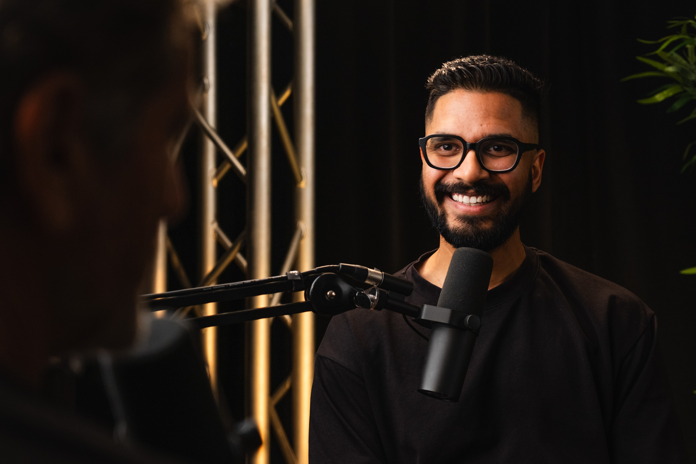 Ravi Sharma speaking on a podcast